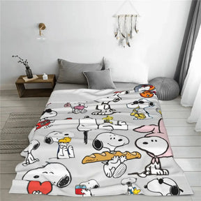 Cobertor Decorativo Snoopy — Aconchego e Estilo para Seu Lar